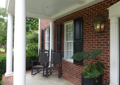 Raised Panel Shutters on brick