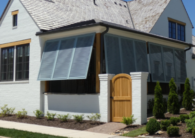 Bahama shutters on porch